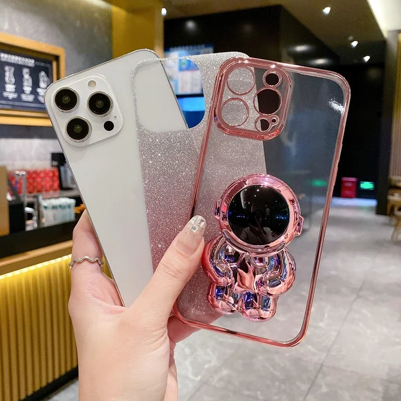 Luxus-Glitzer-Astronauten-Falt-Silikonhülle mit Ständer und Handhalterung für Apple iPhone 17/17 Air, 16/16e, 15, 14, 13 Pro Max Plus | Stoßfest, wasserabweisend & fingerabdruckfrei